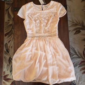 Francesca's size XS peach colored dress